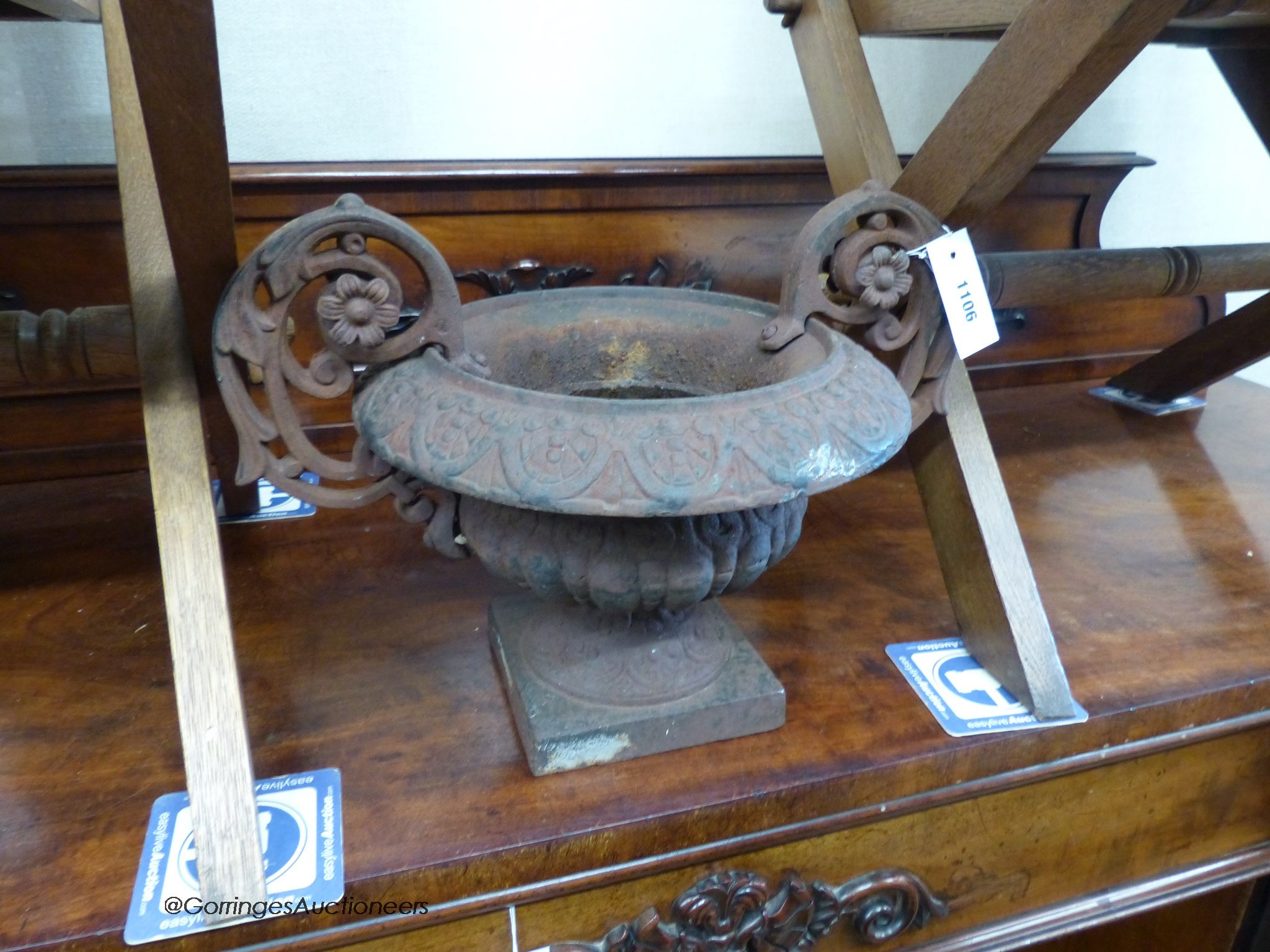 A cast iron garden urn, W-42,H-30.